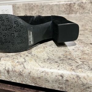 Blondo Black suede lace up and zipper waterproof booties. Size 9 M